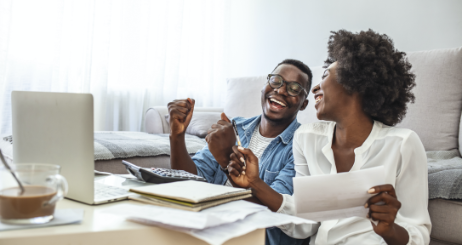 Mother And Son Laughing In Living Room